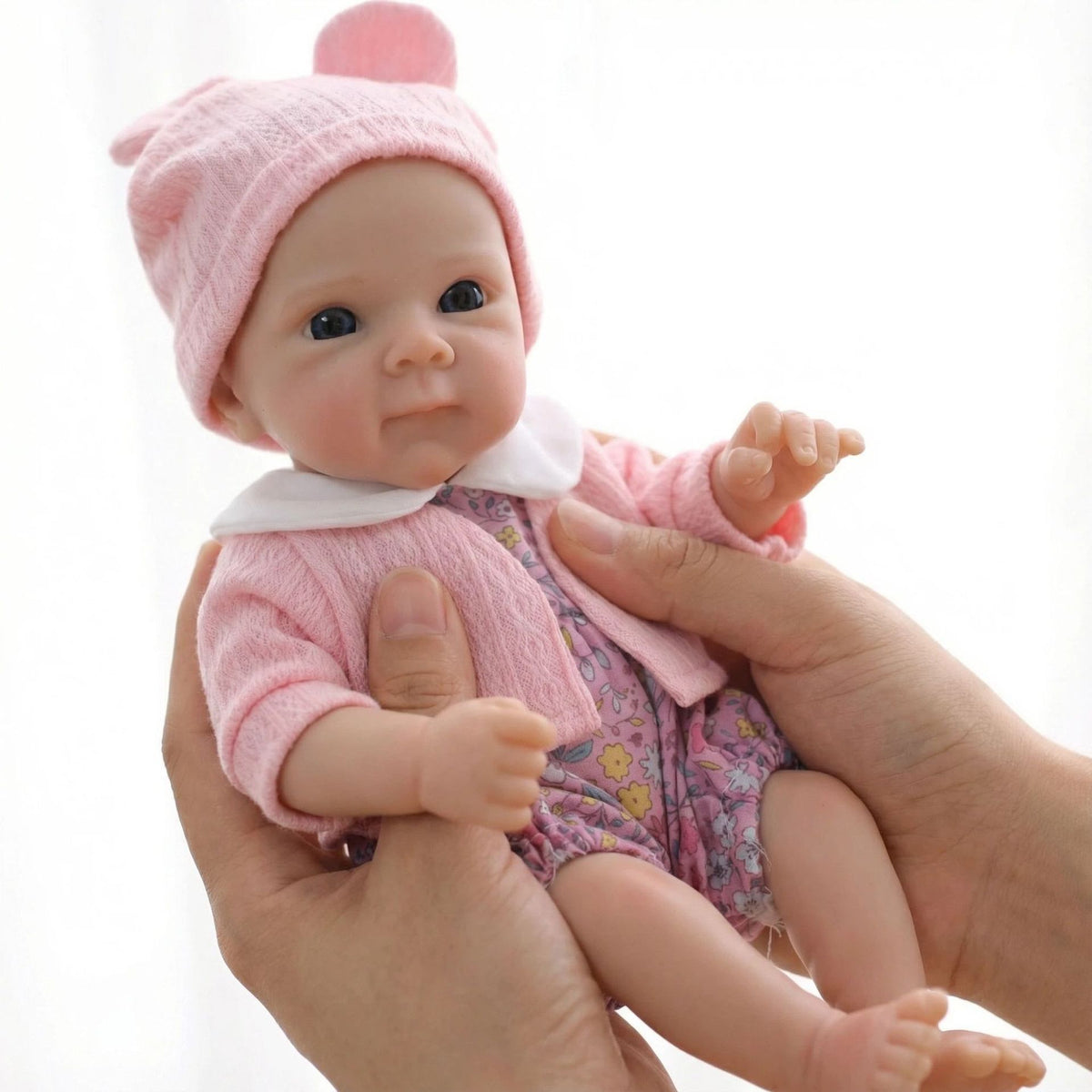 12 inch pink jacket with small floral full silicone reborn doll
